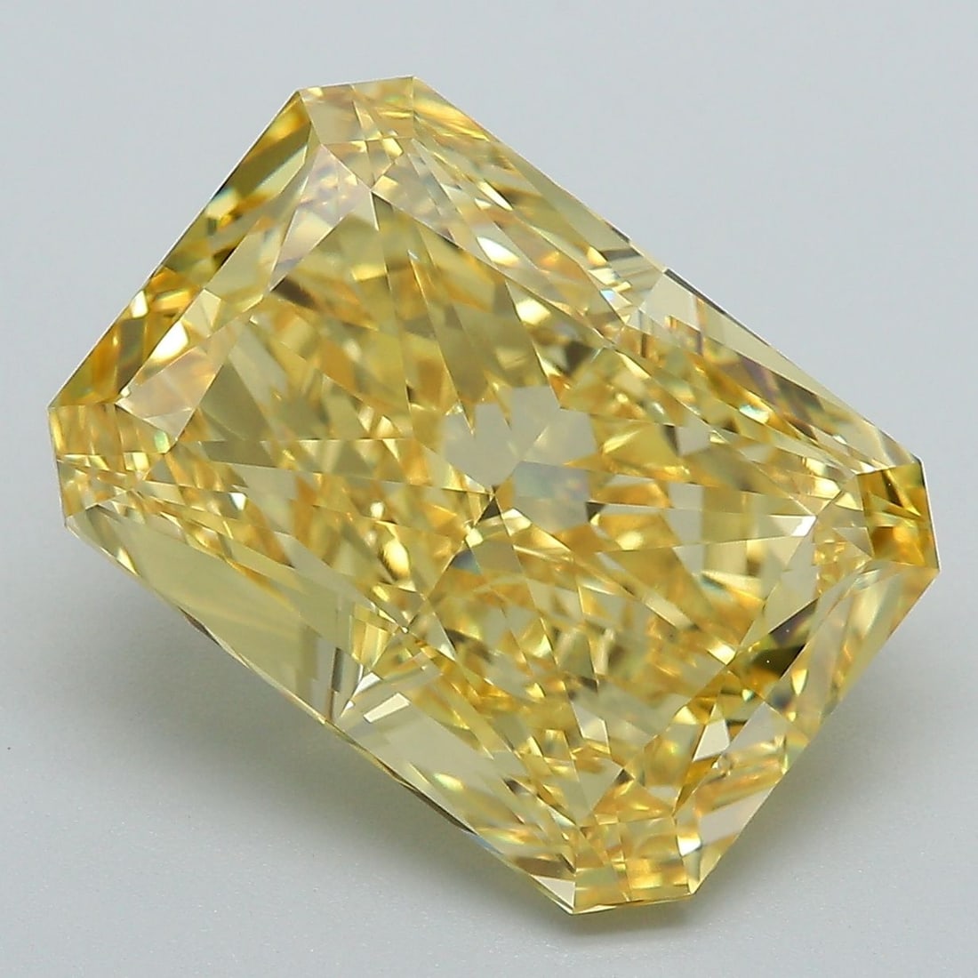 Loose Diamond - RADIANT 9.0ct Fancy Vivid Yellow VS1: Loose Diamond - RADIANT 9.0ct Fancy Vivid Yellow VS1 Source: This is a real non-mined Diamond that has been grown in a lab Shape: RADIANT Carats: 9.0 Color: Fancy Vivid Yellow Certification: IGI Video