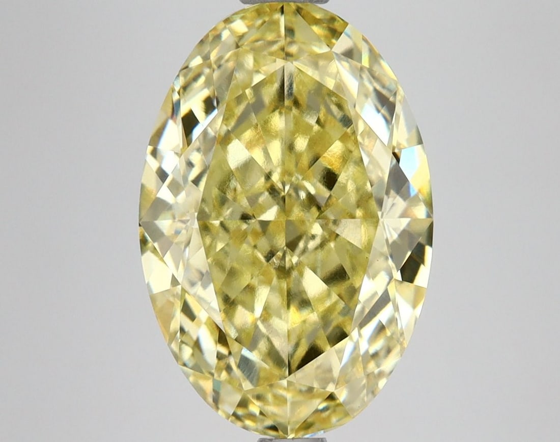 Loose Diamond - OVAL 4.61ct Fancy Vivid Yellow VS1: Loose Diamond - OVAL 4.61ct Fancy Vivid Yellow VS1 Source: This is a real non-mined Diamond that has been grown in a lab Shape: OVAL Carats: 4.61 Color: Fancy Vivid Yellow Certification: IGI Video: