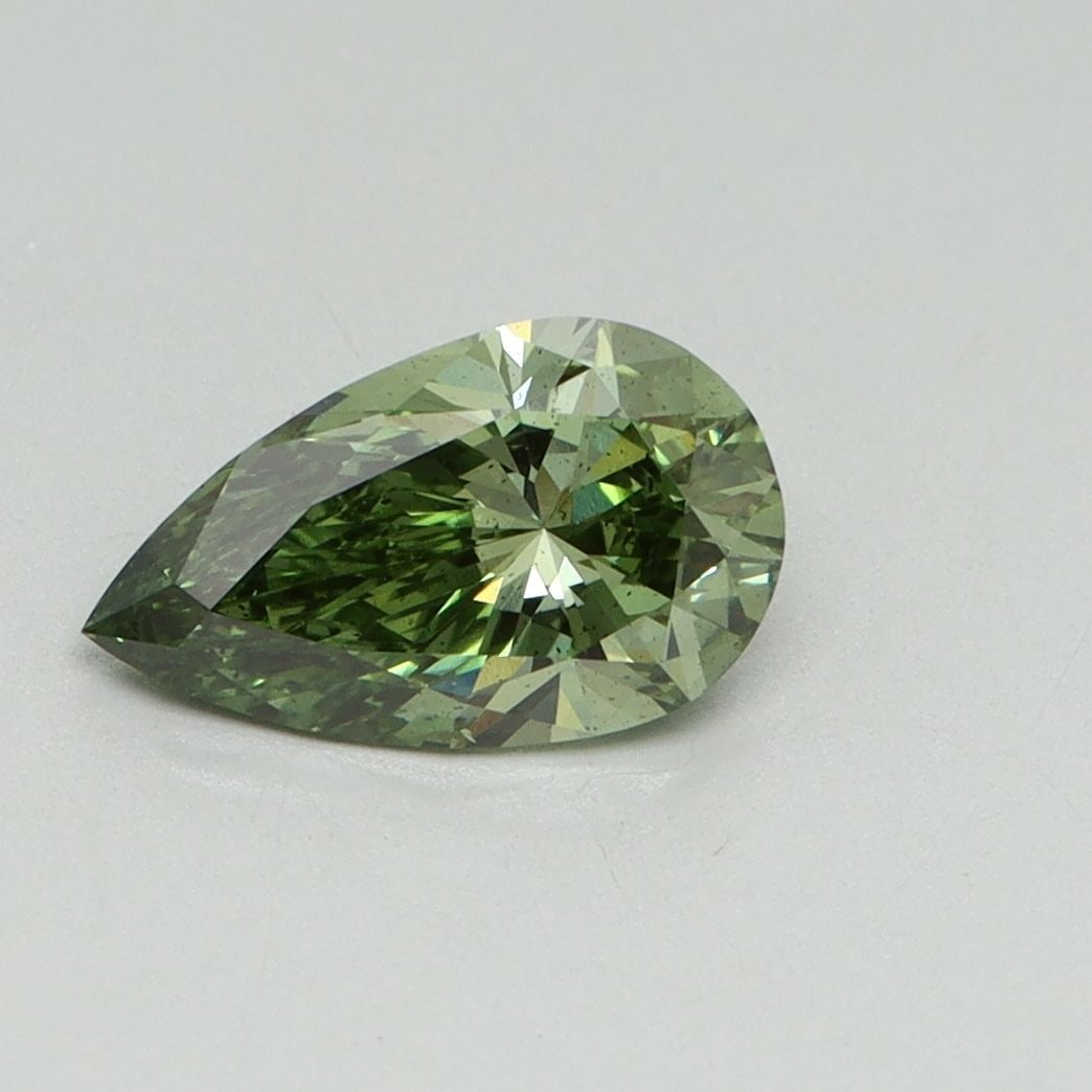 Loose Diamond - PEAR 1.01ct Fancy Vivid Green SI1: Loose Diamond - PEAR 1.01ct Fancy Vivid Green SI1 Source: This is a real non-mined Diamond that has been grown in a lab Shape: PEAR Carats: 1.01 Color: Fancy Vivid Green Certification: IGI Video: