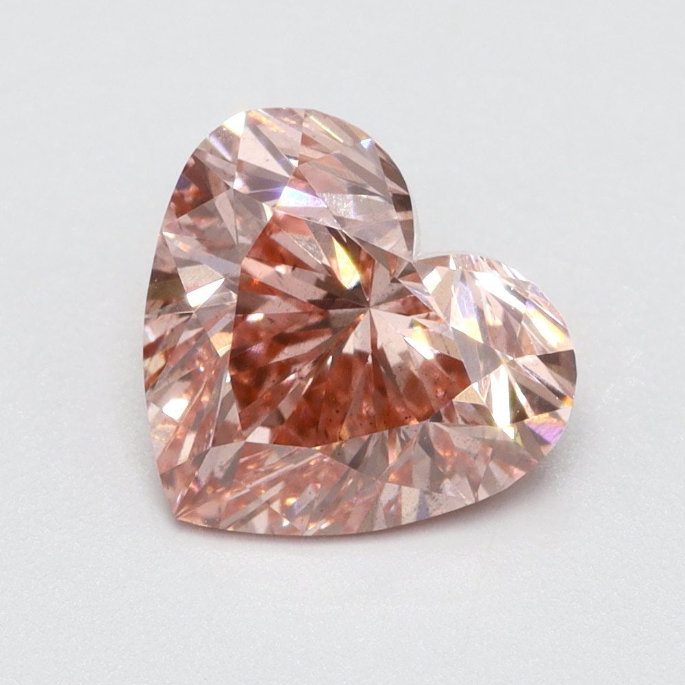 Loose Diamond - HEART 1.03ct Fancy Vivid Pink SI1: Loose Diamond - HEART 1.03ct Fancy Vivid Pink SI1 Source: This is a real non-mined Diamond that has been grown in a lab Shape: HEART Carats: 1.03 Color: Fancy Vivid Pink Certification: NONE Video:
