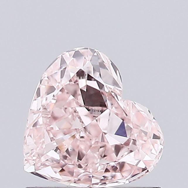 Loose Diamond - HEART 0.67ct Fancy Pink VS1: Loose Diamond - HEART 0.67ct Fancy Pink VS1 Source: This is a real non-mined Diamond that has been grown in a lab Shape: HEART Carats: 0.67 Color: Fancy Pink Certification: IGI Video: