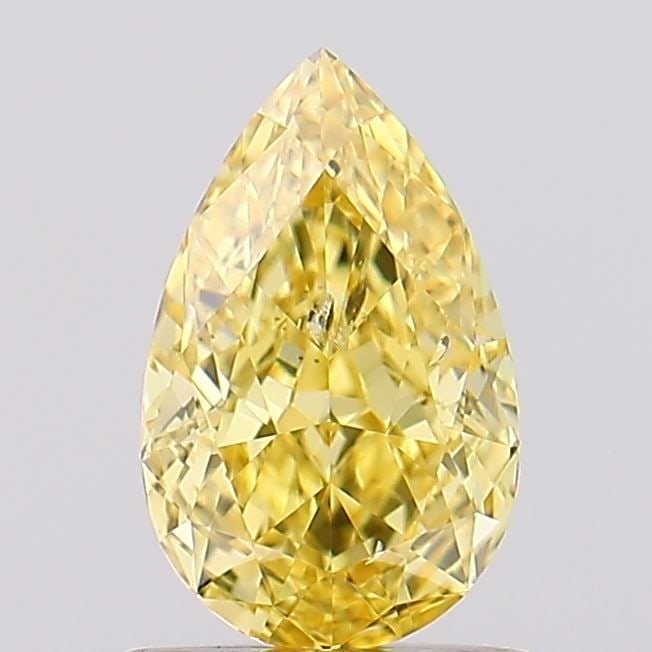 Loose Diamond - PEAR 1.0ct Fancy Vivid Yellow SI1: Loose Diamond - PEAR 1.0ct Fancy Vivid Yellow SI1 Source: This is a real non-mined Diamond that has been grown in a lab Shape: PEAR Carats: 1.0 Color: Fancy Vivid Yellow Certification: IGI Video:
