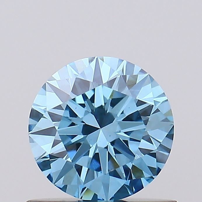 Loose Diamond - ROUND 0.64ct Fancy Vivid Blue VS1: Loose Diamond - ROUND 0.64ct Fancy Vivid Blue VS1 Source: This is a real non-mined Diamond that has been grown in a lab Shape: ROUND Carats: 0.64 Color: Fancy Vivid Blue Certification: IGI Video: