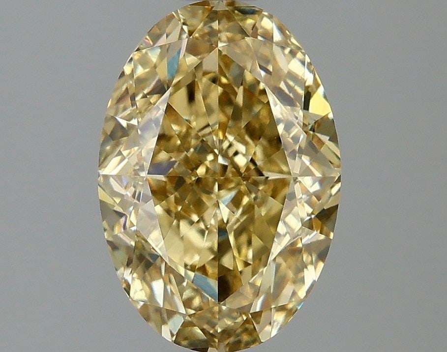 Loose Diamond - OVAL 2.1ct Fancy Intense Yellow VS1: Loose Diamond - OVAL 2.1ct Fancy Intense Yellow VS1 Source: This is a real non-mined Diamond that has been grown in a lab Shape: OVAL Carats: 2.1 Color: Fancy Intense Yellow Certification: IGI Video: