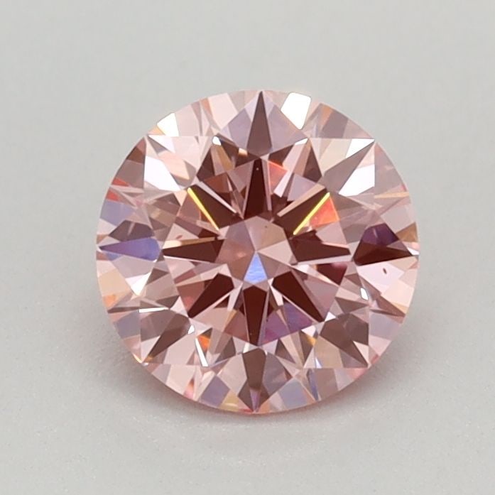 Ideal Loose Diamond - ROUND 0.59ct Fancy Vivid Pink VS1: Ideal Loose Diamond - ROUND 0.59ct Fancy Vivid Pink VS1 Source: This is a real non-mined Diamond that has been grown in a lab Shape: ROUND Carats: 0.59 Color: Fancy Vivid Pink Certification: IGI Video