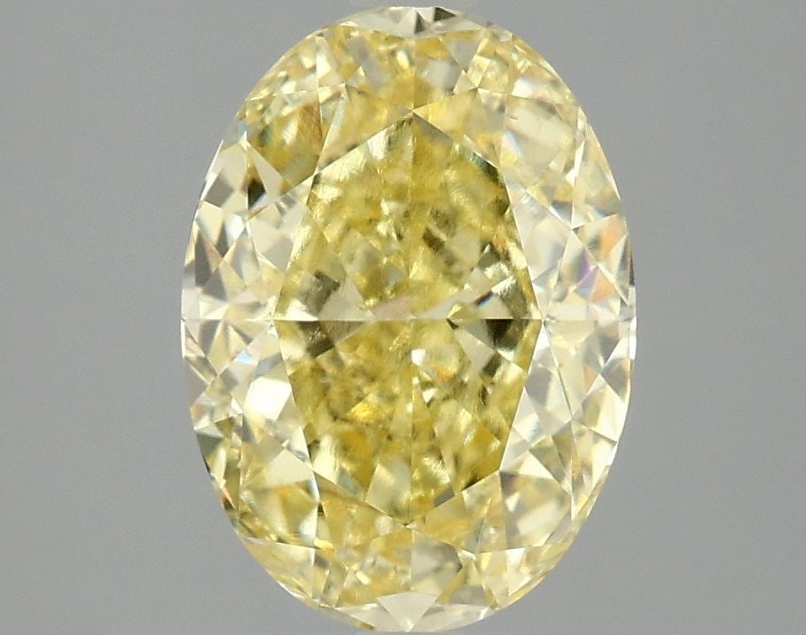 Loose Diamond - OVAL 3.05ct Fancy Vivid Yellow VS2: Loose Diamond - OVAL 3.05ct Fancy Vivid Yellow VS2 Source: This is a real non-mined Diamond that has been grown in a lab Shape: OVAL Carats: 3.05 Color: Fancy Vivid Yellow Certification: IGI Video: