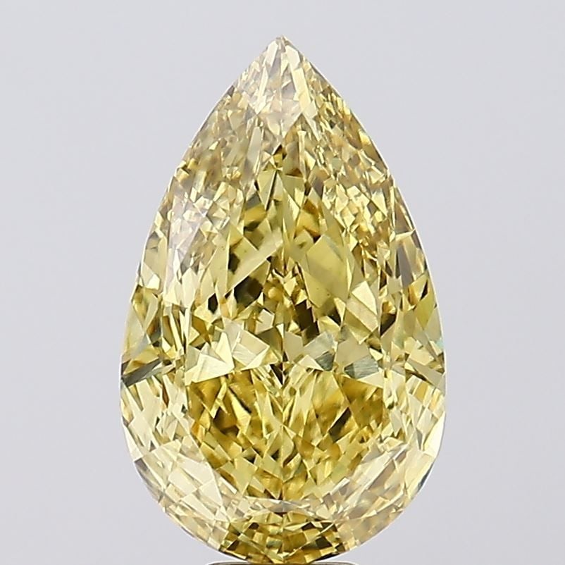 Loose Diamond - PEAR 12.19ct Fancy Vivid Yellow VS2: Loose Diamond - PEAR 12.19ct Fancy Vivid Yellow VS2 Source: This is a real non-mined Diamond that has been grown in a lab Shape: PEAR Carats: 12.19 Color: Fancy Vivid Yellow Certification: IGI Video: