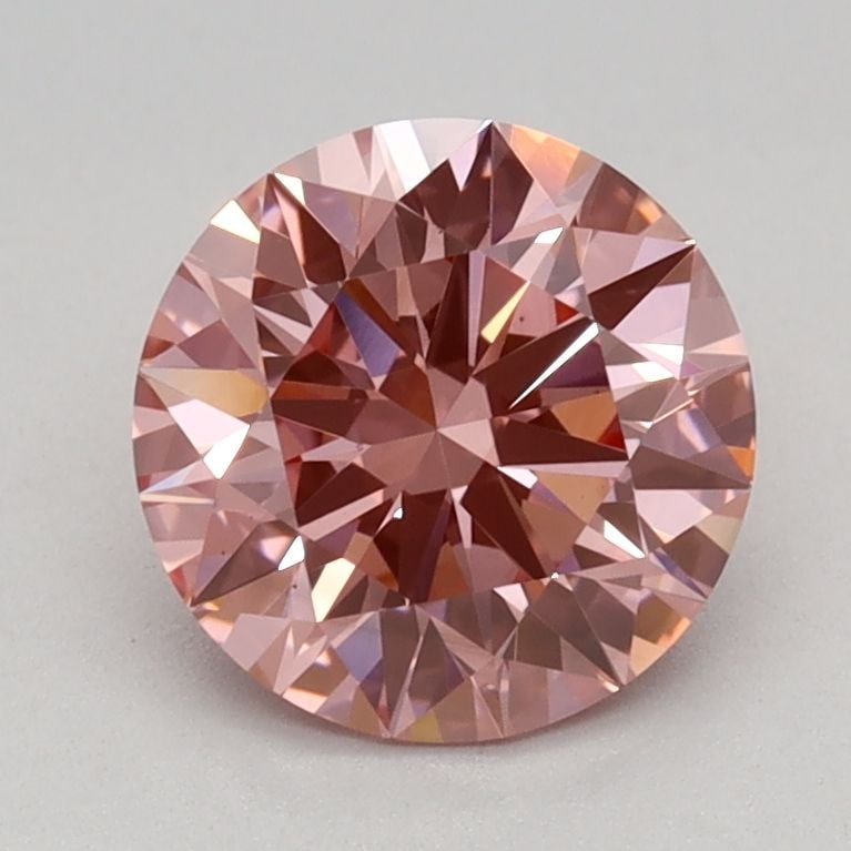 Ideal Loose Diamond - ROUND 1.09ct Fancy Vivid Pink VS1: Ideal Loose Diamond - ROUND 1.09ct Fancy Vivid Pink VS1 Source: This is a real non-mined Diamond that has been grown in a lab Shape: ROUND Carats: 1.09 Color: Fancy Vivid Pink Certification: IGI Video