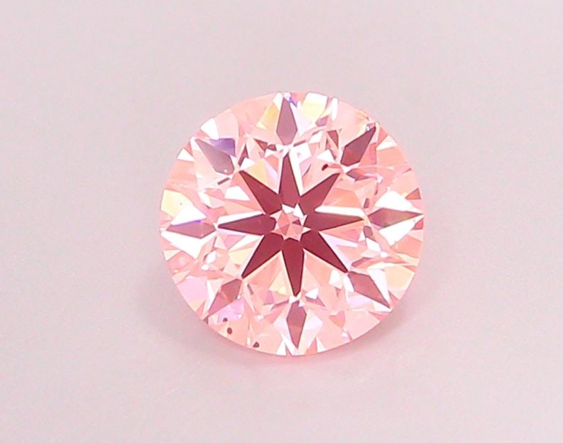Loose Diamond - ROUND 1.14ct Fancy Vivid Pink SI1: Loose Diamond - ROUND 1.14ct Fancy Vivid Pink SI1 Source: This is a real non-mined Diamond that has been grown in a lab Shape: ROUND Carats: 1.14 Color: Fancy Vivid Pink Certification: IGI Video: