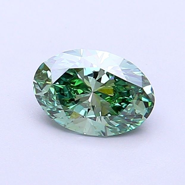 Loose Diamond - OVAL 0.71ct Fancy Vivid Green VS2: Loose Diamond - OVAL 0.71ct Fancy Vivid Green VS2 Source: This is a real non-mined Diamond that has been grown in a lab Shape: OVAL Carats: 0.71 Color: Fancy Vivid Green Certification: IGI Video: