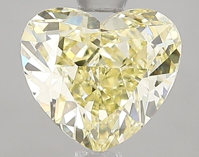 Loose Diamond - HEART 1.56ct Fancy Yellow VS1: Loose Diamond - HEART 1.56ct Fancy Yellow VS1 Source: This is a real non-mined Diamond that has been grown in a lab Shape: HEART Carats: 1.56 Color: Fancy Yellow Certification: IGI Video: