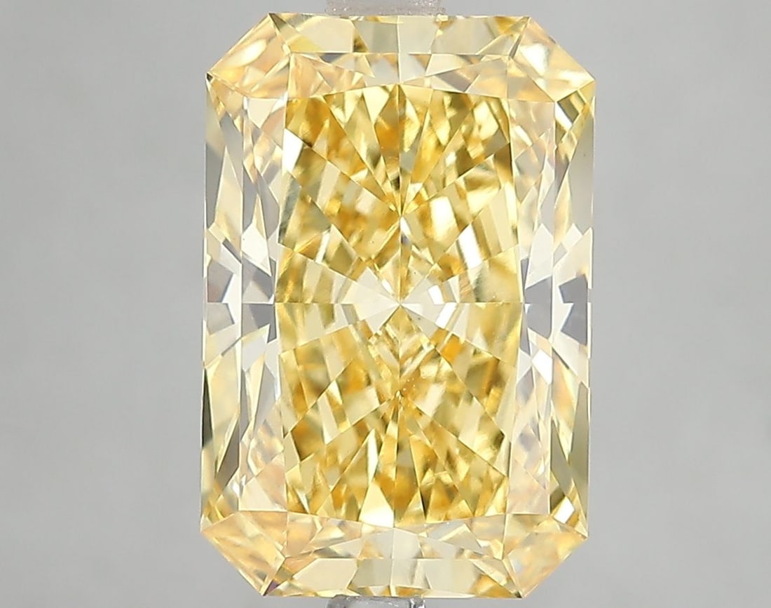Loose Diamond - RADIANT 5.09ct Fancy Vivid Yellow VS1: Loose Diamond - RADIANT 5.09ct Fancy Vivid Yellow VS1 Source: This is a real non-mined Diamond that has been grown in a lab Shape: RADIANT Carats: 5.09 Color: Fancy Vivid Yellow Certification: IGI Vid