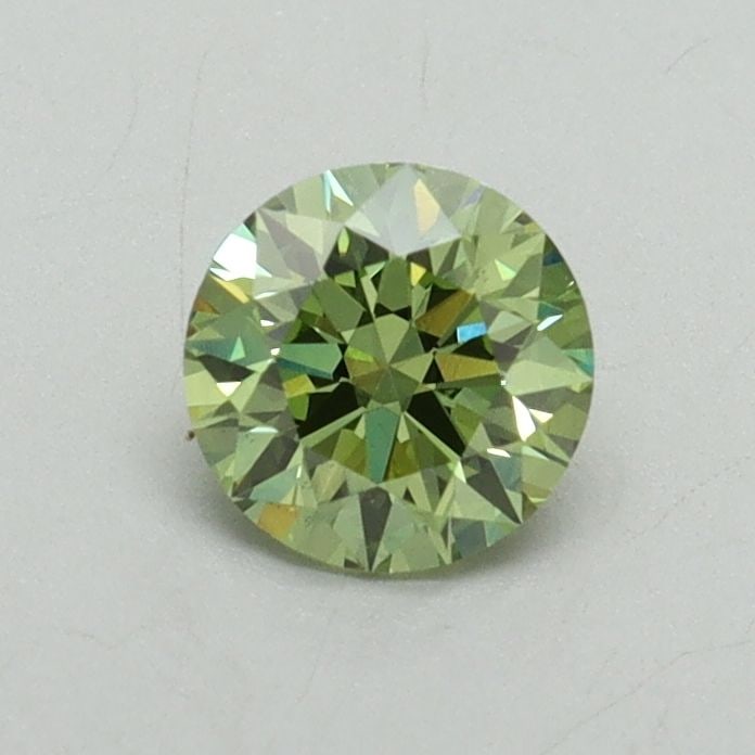 Loose Diamond - ROUND 0.55ct Fancy Vivid Green VS2: Loose Diamond - ROUND 0.55ct Fancy Vivid Green VS2 Source: This is a real non-mined Diamond that has been grown in a lab Shape: ROUND Carats: 0.55 Color: Fancy Vivid Green Certification: IGI Video:
