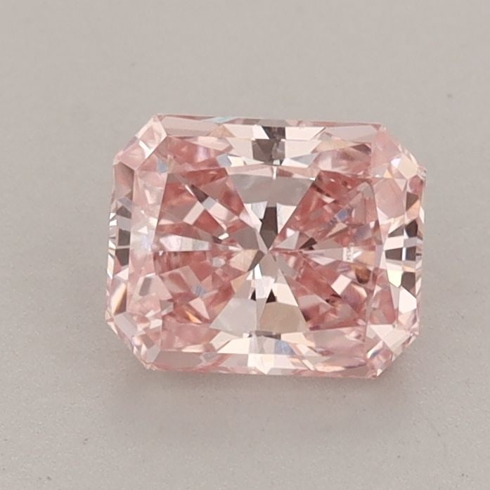 Loose Diamond - RADIANT 0.95ct Fancy Vivid Pink VS1: Loose Diamond - RADIANT 0.95ct Fancy Vivid Pink VS1 Source: This is a real non-mined Diamond that has been grown in a lab Shape: RADIANT Carats: 0.95 Color: Fancy Vivid Pink Certification: IGI Video: