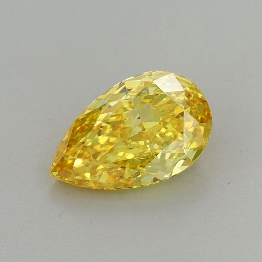 Loose Diamond - PEAR 1.03ct Fancy Vivid Yellow VS1: Loose Diamond - PEAR 1.03ct Fancy Vivid Yellow VS1 Source: This is a real non-mined Diamond that has been grown in a lab Shape: PEAR Carats: 1.03 Color: Fancy Vivid Yellow Certification: IGI Video: