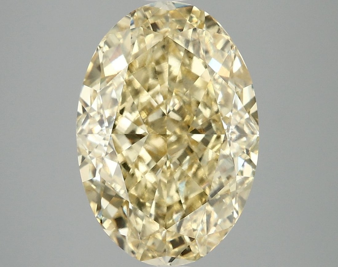 Loose Diamond - OVAL 5.1ct Fancy Vivid Yellow VS1: Loose Diamond - OVAL 5.1ct Fancy Vivid Yellow VS1 Source: This is a real non-mined Diamond that has been grown in a lab Shape: OVAL Carats: 5.1 Color: Fancy Vivid Yellow Certification: IGI Video: