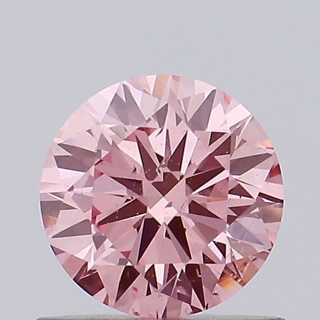 Loose Diamond - ROUND 0.65ct Fancy Vivid Pink SI1: Loose Diamond - ROUND 0.65ct Fancy Vivid Pink SI1 Source: This is a real non-mined Diamond that has been grown in a lab Shape: ROUND Carats: 0.65 Color: Fancy Vivid Pink Certification: NONE Video: