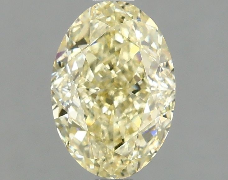 Loose Diamond - OVAL 1.59ct Fancy Intense Yellow VS1: Loose Diamond - OVAL 1.59ct Fancy Intense Yellow VS1 Source: This is a real non-mined Diamond that has been grown in a lab Shape: OVAL Carats: 1.59 Color: Fancy Intense Yellow Certification: IGI Video