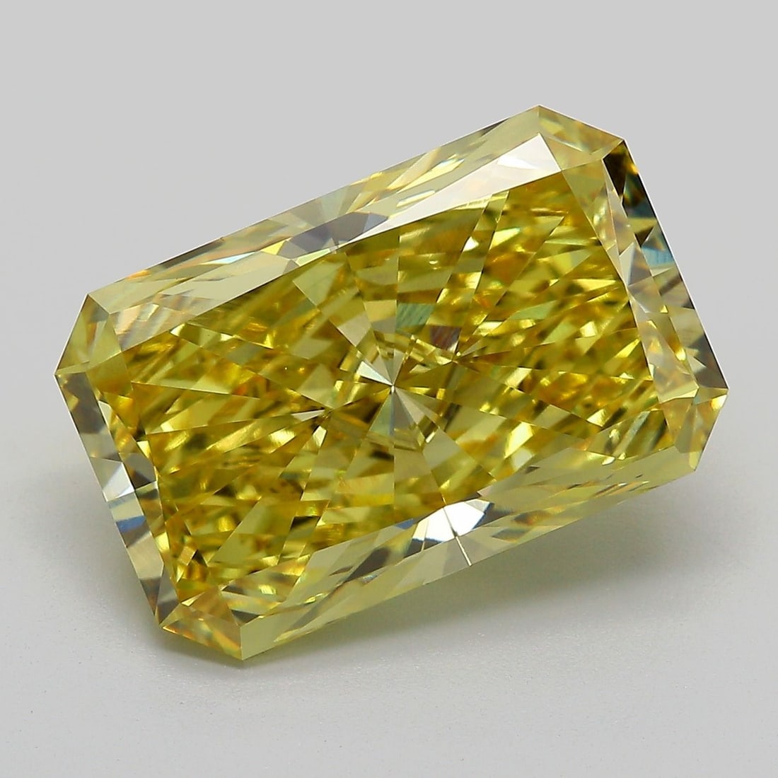 Loose Diamond - RADIANT 10.01ct Fancy Vivid Yellow VS1: Loose Diamond - RADIANT 10.01ct Fancy Vivid Yellow VS1 Source: This is a real non-mined Diamond that has been grown in a lab Shape: RADIANT Carats: 10.01 Color: Fancy Vivid Yellow Certification: IGI V