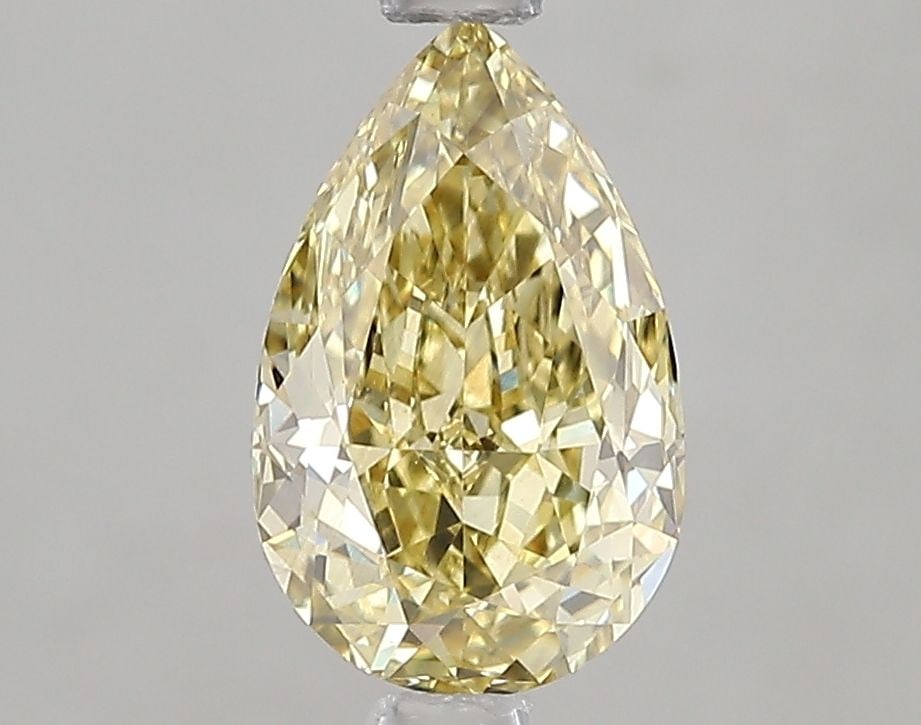Loose Diamond - PEAR 1.57ct Fancy Intense Yellow VS2: Loose Diamond - PEAR 1.57ct Fancy Intense Yellow VS2 Source: This is a real non-mined Diamond that has been grown in a lab Shape: PEAR Carats: 1.57 Color: Fancy Intense Yellow Certification: IGI Video