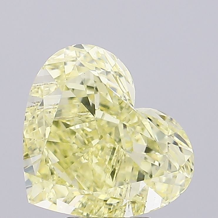 Loose Diamond - HEART 6.1ct Fancy Intense Yellow VS2: Loose Diamond - HEART 6.1ct Fancy Intense Yellow VS2 Source: This is a real non-mined Diamond that has been grown in a lab Shape: HEART Carats: 6.1 Color: Fancy Intense Yellow Certification: IGI Video