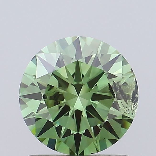 Loose Diamond - ROUND 1.0ct Fancy Vivid Green I1: Loose Diamond - ROUND 1.0ct Fancy Vivid Green I1 Source: This is a real non-mined Diamond that has been grown in a lab Shape: ROUND Carats: 1.0 Color: Fancy Vivid Green Certification: IGI Video: