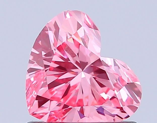 Loose Diamond - HEART 0.85ct Fancy Vivid Pink VS1: Loose Diamond - HEART 0.85ct Fancy Vivid Pink VS1 Source: This is a real non-mined Diamond that has been grown in a lab Shape: HEART Carats: 0.85 Color: Fancy Vivid Pink Certification: IGI Video: