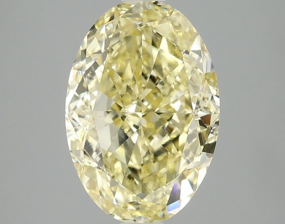 Loose Diamond - OVAL 4.01ct Fancy Intense Yellow VS1: Loose Diamond - OVAL 4.01ct Fancy Intense Yellow VS1 Source: This is a real non-mined Diamond that has been grown in a lab Shape: OVAL Carats: 4.01 Color: Fancy Intense Yellow Certification: IGI Video