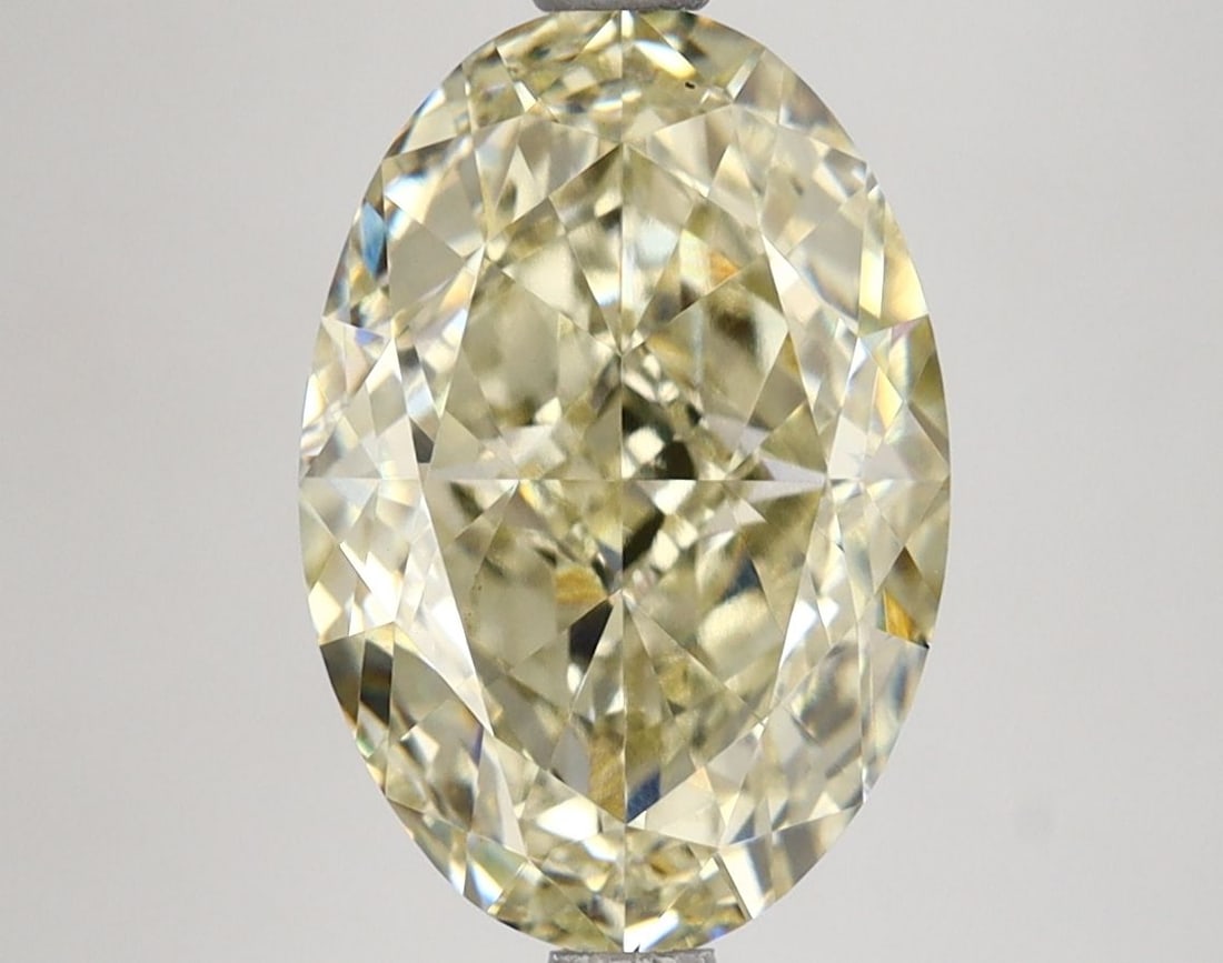 Loose Diamond - OVAL 4.16ct Fancy Yellow VS1: Loose Diamond - OVAL 4.16ct Fancy Yellow VS1 Source: This is a real non-mined Diamond that has been grown in a lab Shape: OVAL Carats: 4.16 Color: Fancy Yellow Certification: IGI Video: