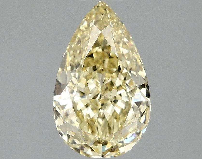 Loose Diamond - PEAR 1.58ct Fancy Vivid Yellow VVS2: Loose Diamond - PEAR 1.58ct Fancy Vivid Yellow VVS2 Source: This is a real non-mined Diamond that has been grown in a lab Shape: PEAR Carats: 1.58 Color: Fancy Vivid Yellow Certification: IGI Video: