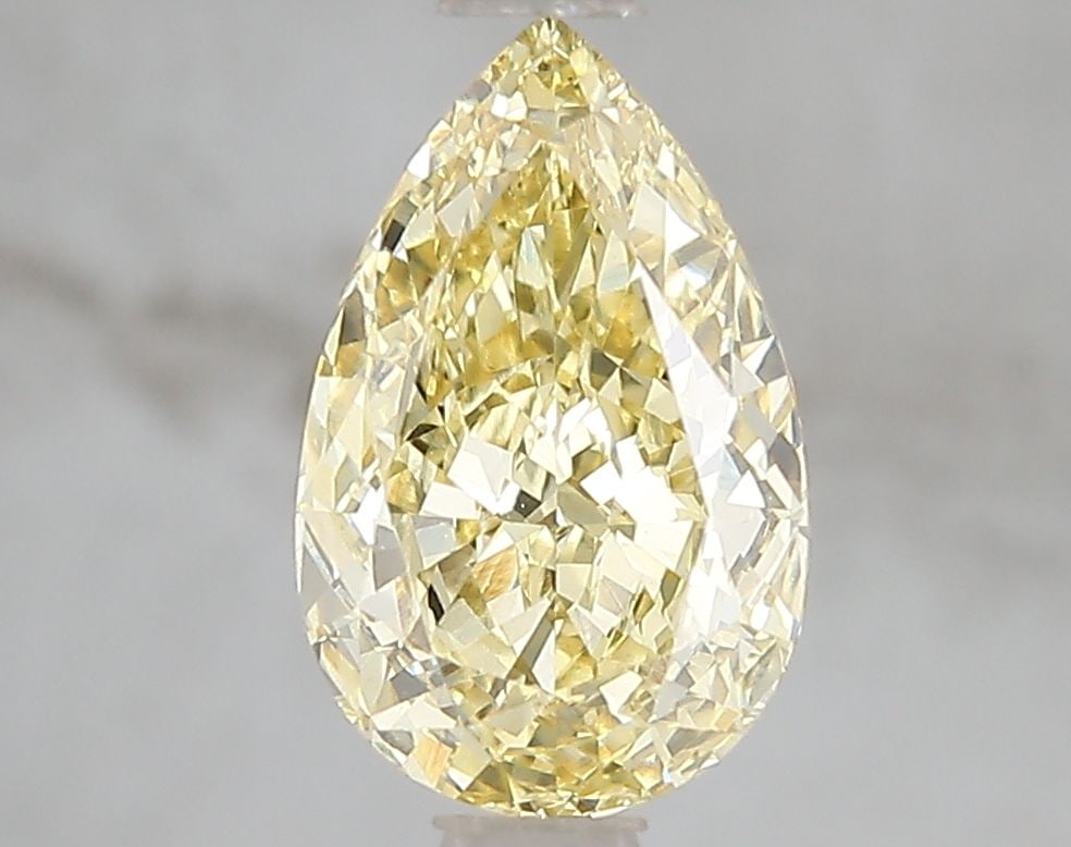 Loose Diamond - PEAR 2.02ct Fancy Vivid Yellow VS2: Loose Diamond - PEAR 2.02ct Fancy Vivid Yellow VS2 Source: This is a real non-mined Diamond that has been grown in a lab Shape: PEAR Carats: 2.02 Color: Fancy Vivid Yellow Certification: IGI Video: