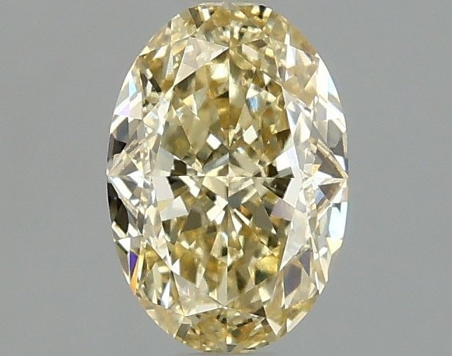 Loose Diamond - OVAL 1.1ct Fancy Yellow VVS2: Loose Diamond - OVAL 1.1ct Fancy Yellow VVS2 Source: This is a real non-mined Diamond that has been grown in a lab Shape: OVAL Carats: 1.1 Color: Fancy Yellow Certification: IGI Video: