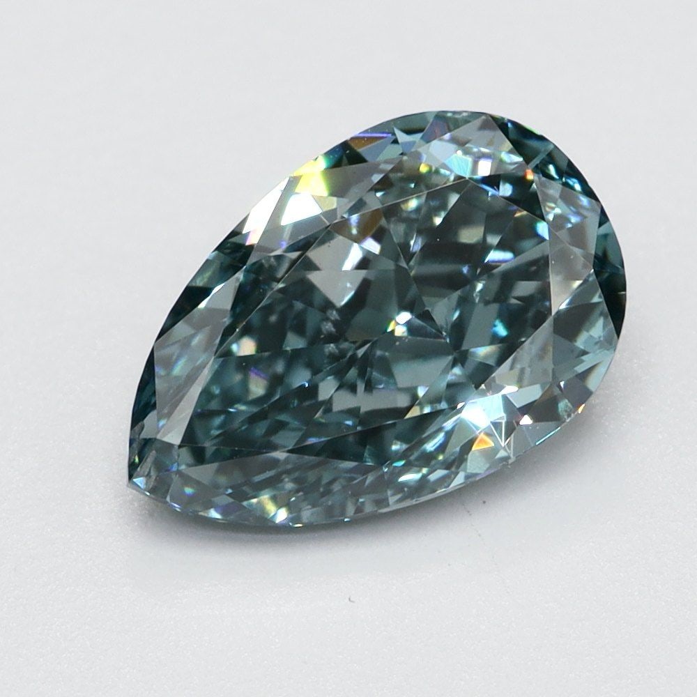 Loose Diamond - PEAR 1.13ct Fancy Vivid Blue VS2: Loose Diamond - PEAR 1.13ct Fancy Vivid Blue VS2 Source: This is a real non-mined Diamond that has been grown in a lab Shape: PEAR Carats: 1.13 Color: Fancy Vivid Blue Certification: NONE Video: