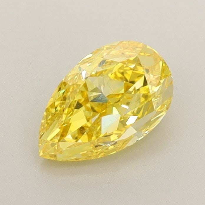 Loose Diamond - PEAR 0.81ct Fancy Vivid Yellow VVS2: Loose Diamond - PEAR 0.81ct Fancy Vivid Yellow VVS2 Source: This is a real non-mined Diamond that has been grown in a lab Shape: PEAR Carats: 0.81 Color: Fancy Vivid Yellow Certification: IGI Video: