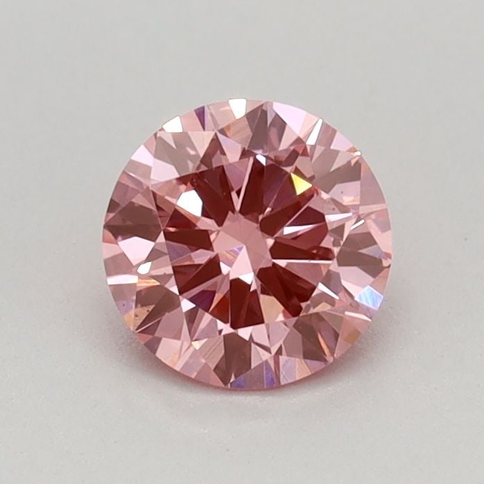 Loose Diamond - ROUND 0.44ct Fancy Vivid Pink VS2: Loose Diamond - ROUND 0.44ct Fancy Vivid Pink VS2 Source: This is a real non-mined Diamond that has been grown in a lab Shape: ROUND Carats: 0.44 Color: Fancy Vivid Pink Certification: IGI Video: