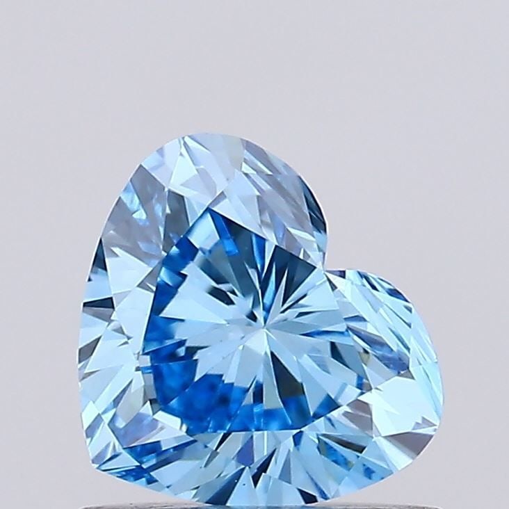 Loose Diamond - HEART 0.74ct Fancy Vivid Blue VS1: Loose Diamond - HEART 0.74ct Fancy Vivid Blue VS1 Source: This is a real non-mined Diamond that has been grown in a lab Shape: HEART Carats: 0.74 Color: Fancy Vivid Blue Certification: IGI Video: