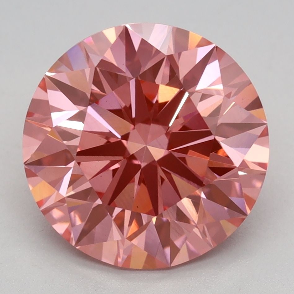 Ideal Loose Diamond - ROUND 3.09ct Fancy Vivid Pink VS1: Ideal Loose Diamond - ROUND 3.09ct Fancy Vivid Pink VS1 Source: This is a real non-mined Diamond that has been grown in a lab Shape: ROUND Carats: 3.09 Color: Fancy Vivid Pink Certification: IGI Video