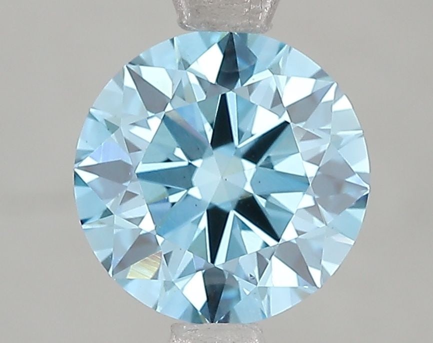 Ideal Loose Diamond - ROUND 2.02ct Fancy Vivid Blue VS2: Ideal Loose Diamond - ROUND 2.02ct Fancy Vivid Blue VS2 Source: This is a real non-mined Diamond that has been grown in a lab Shape: ROUND Carats: 2.02 Color: Fancy Vivid Blue Certification: IGI Video