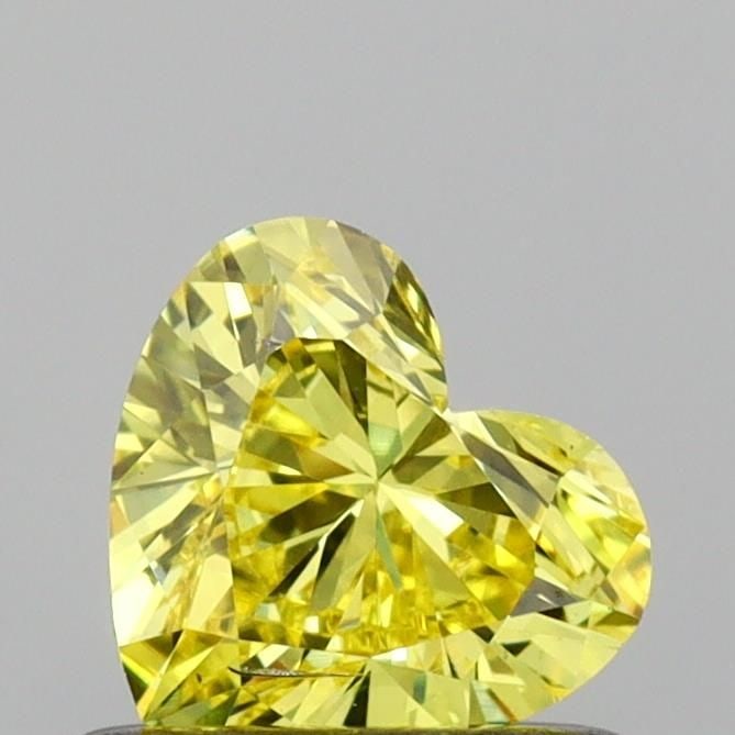 Loose Diamond - HEART 0.53ct Fancy Vivid Yellow SI1: Loose Diamond - HEART 0.53ct Fancy Vivid Yellow SI1 Source: This is a real non-mined Diamond that has been grown in a lab Shape: HEART Carats: 0.53 Color: Fancy Vivid Yellow Certification: IGI Video: