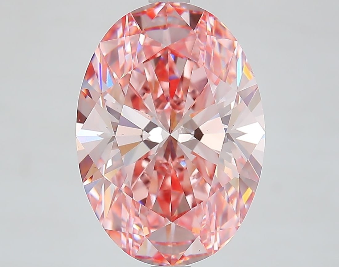 Loose Diamond - OVAL 5.19ct Fancy Vivid Pink VS2: Loose Diamond - OVAL 5.19ct Fancy Vivid Pink VS2 Source: This is a real non-mined Diamond that has been grown in a lab Shape: OVAL Carats: 5.19 Color: Fancy Vivid Pink Certification: IGI Video: