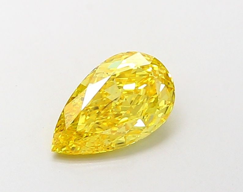 Loose Diamond - PEAR 1.19ct Fancy Vivid Yellow SI1: Loose Diamond - PEAR 1.19ct Fancy Vivid Yellow SI1 Source: This is a real non-mined Diamond that has been grown in a lab Shape: PEAR Carats: 1.19 Color: Fancy Vivid Yellow Certification: IGI Video: