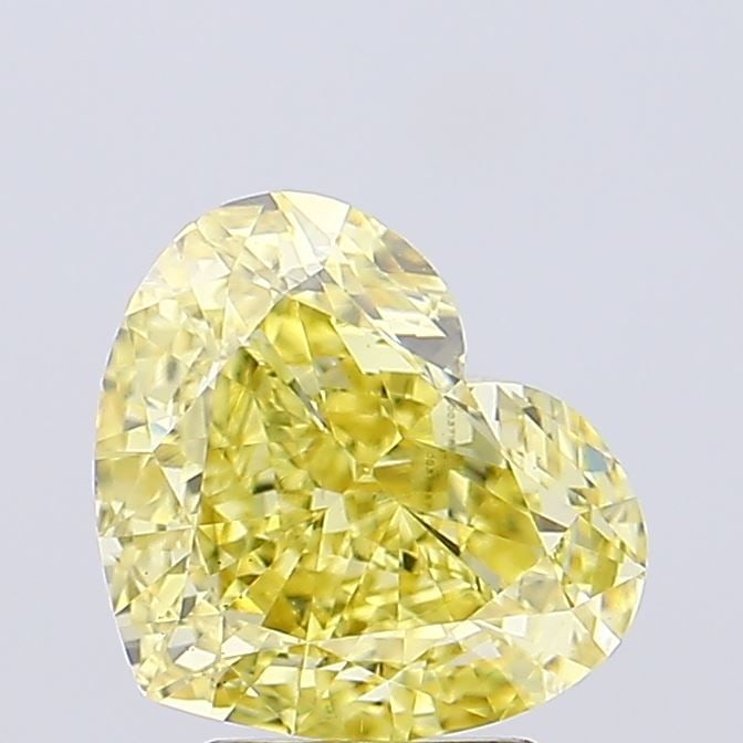 Loose Diamond - HEART 6.5ct Fancy Intense Brownish Yellow VVS2: Loose Diamond - HEART 6.5ct Fancy Intense Brownish Yellow VVS2 Source: This is a real non-mined Diamond that has been grown in a lab Shape: HEART Carats: 6.5 Color: Fancy Intense Brownish Yellow Certi