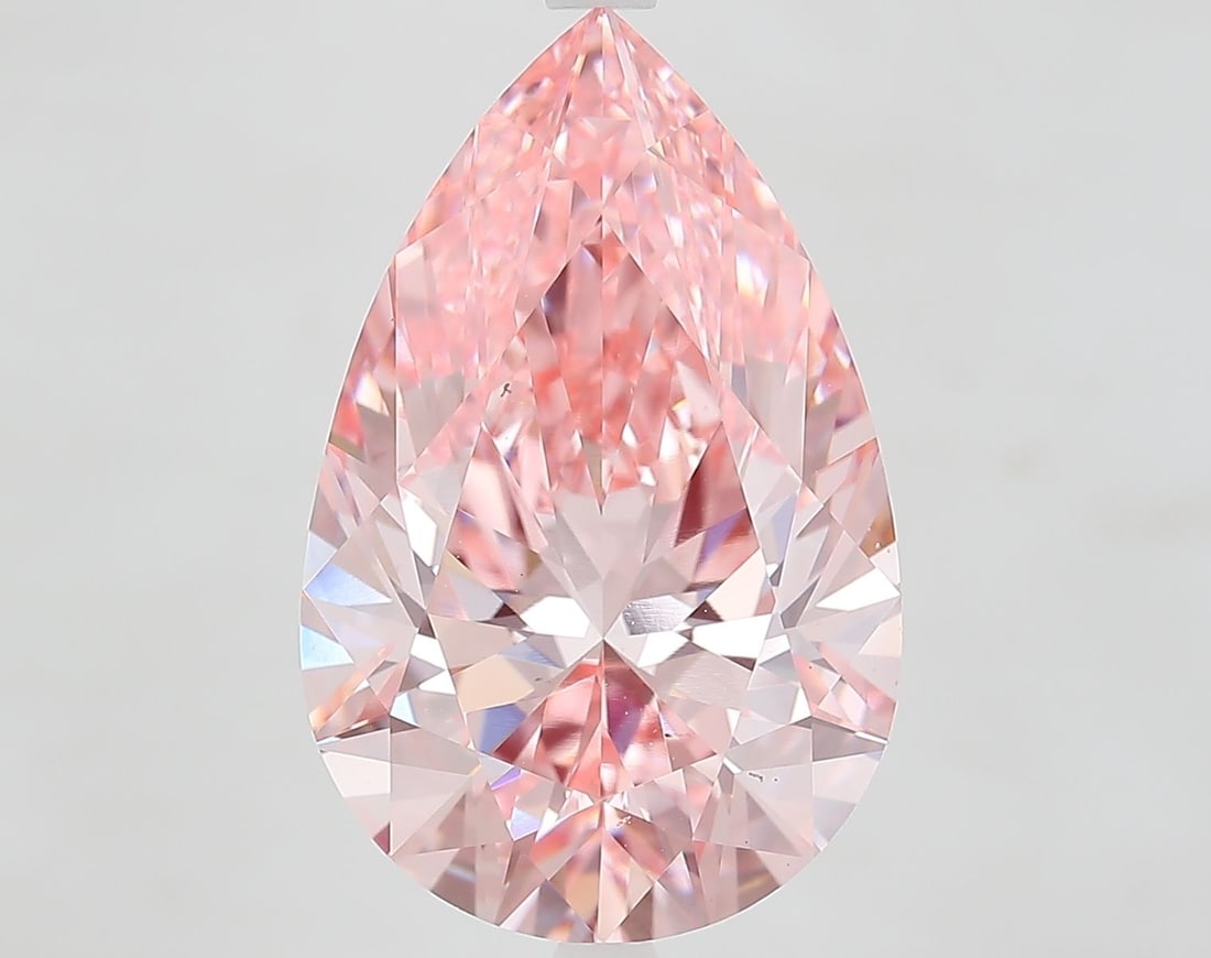 Loose Diamond - PEAR 7.97ct Fancy Vivid Pink VS1: Loose Diamond - PEAR 7.97ct Fancy Vivid Pink VS1 Source: This is a real non-mined Diamond that has been grown in a lab Shape: PEAR Carats: 7.97 Color: Fancy Vivid Pink Certification: IGI Video: