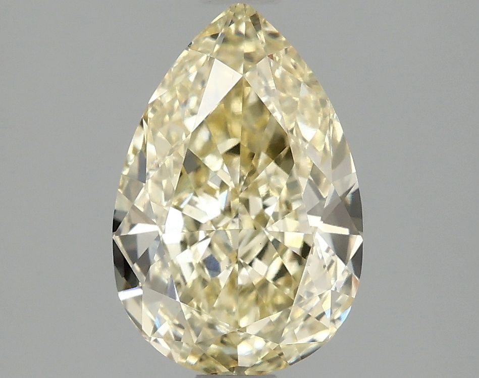 Loose Diamond - PEAR 2.0ct Fancy Vivid Yellow VS1: Loose Diamond - PEAR 2.0ct Fancy Vivid Yellow VS1 Source: This is a real non-mined Diamond that has been grown in a lab Shape: PEAR Carats: 2.0 Color: Fancy Vivid Yellow Certification: IGI Video: