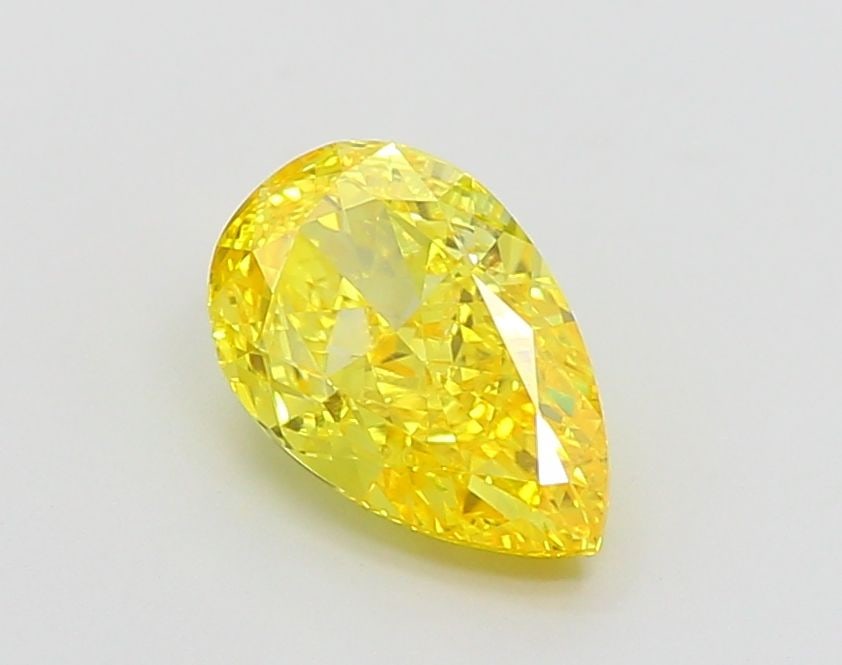 Loose Diamond - PEAR 1.79ct Fancy Vivid Yellow VS1: Loose Diamond - PEAR 1.79ct Fancy Vivid Yellow VS1 Source: This is a real non-mined Diamond that has been grown in a lab Shape: PEAR Carats: 1.79 Color: Fancy Vivid Yellow Certification: IGI Video: