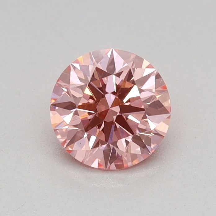 Ideal Loose Diamond - ROUND 0.37ct Fancy Vivid Pink VS1: Ideal Loose Diamond - ROUND 0.37ct Fancy Vivid Pink VS1 Source: This is a real non-mined Diamond that has been grown in a lab Shape: ROUND Carats: 0.37 Color: Fancy Vivid Pink Certification: IGI Video