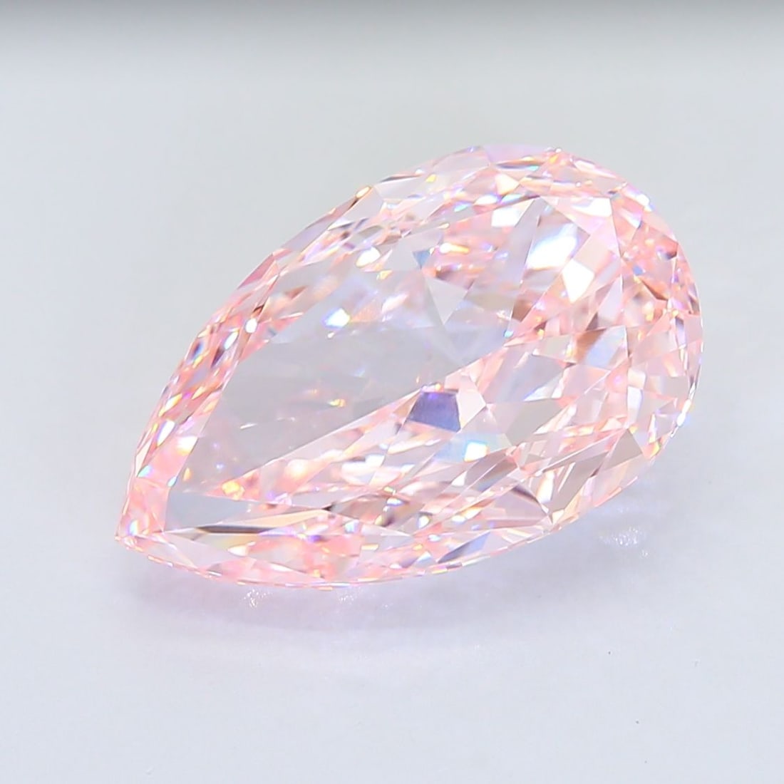 Loose Diamond - PEAR 15.16ct Fancy Intense Pink VVS2: Loose Diamond - PEAR 15.16ct Fancy Intense Pink VVS2 Source: This is a real non-mined Diamond that has been grown in a lab Shape: PEAR Carats: 15.16 Color: Fancy Intense Pink Certification: IGI Video: