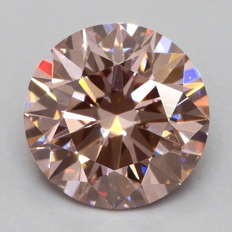 Loose Diamond - ROUND 1.03ct Fancy Intense Pink VS1: Loose Diamond - ROUND 1.03ct Fancy Intense Pink VS1 Source: This is a real non-mined Diamond that has been grown in a lab Shape: ROUND Carats: 1.03 Color: Fancy Intense Pink Certification: NONE Video: