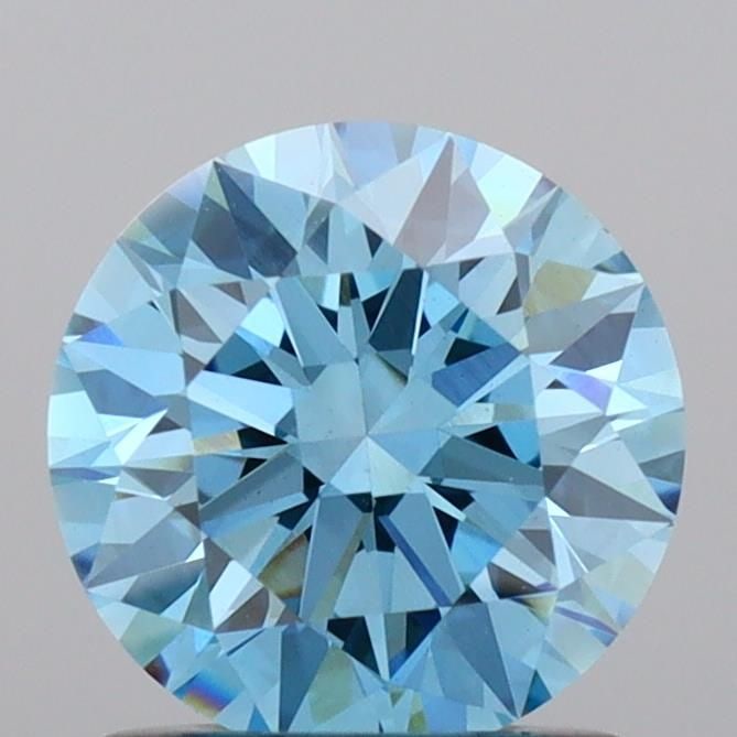 Ideal Loose Diamond - ROUND 1.03ct Fancy Vivid Blue VS1: Ideal Loose Diamond - ROUND 1.03ct Fancy Vivid Blue VS1 Source: This is a real non-mined Diamond that has been grown in a lab Shape: ROUND Carats: 1.03 Color: Fancy Vivid Blue Certification: IGI