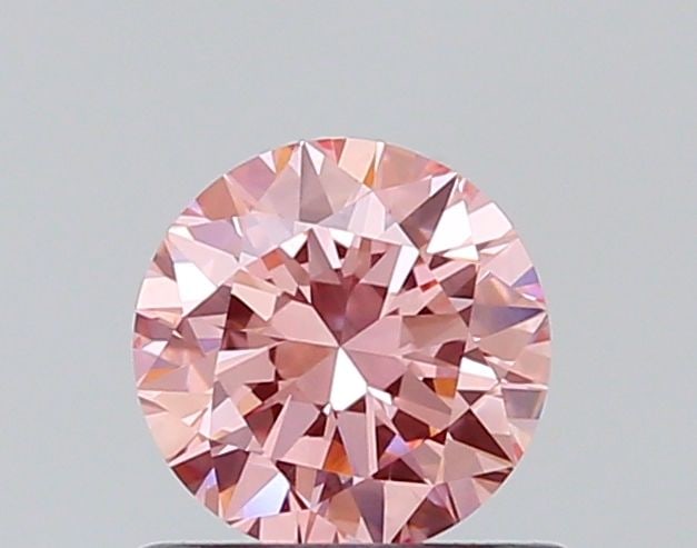 Loose Diamond - ROUND 0.61ct Fancy Vivid Pink VS1: Loose Diamond - ROUND 0.61ct Fancy Vivid Pink VS1 Source: This is a real non-mined Diamond that has been grown in a lab Shape: ROUND Carats: 0.61 Color: Fancy Vivid Pink Certification: NONE 